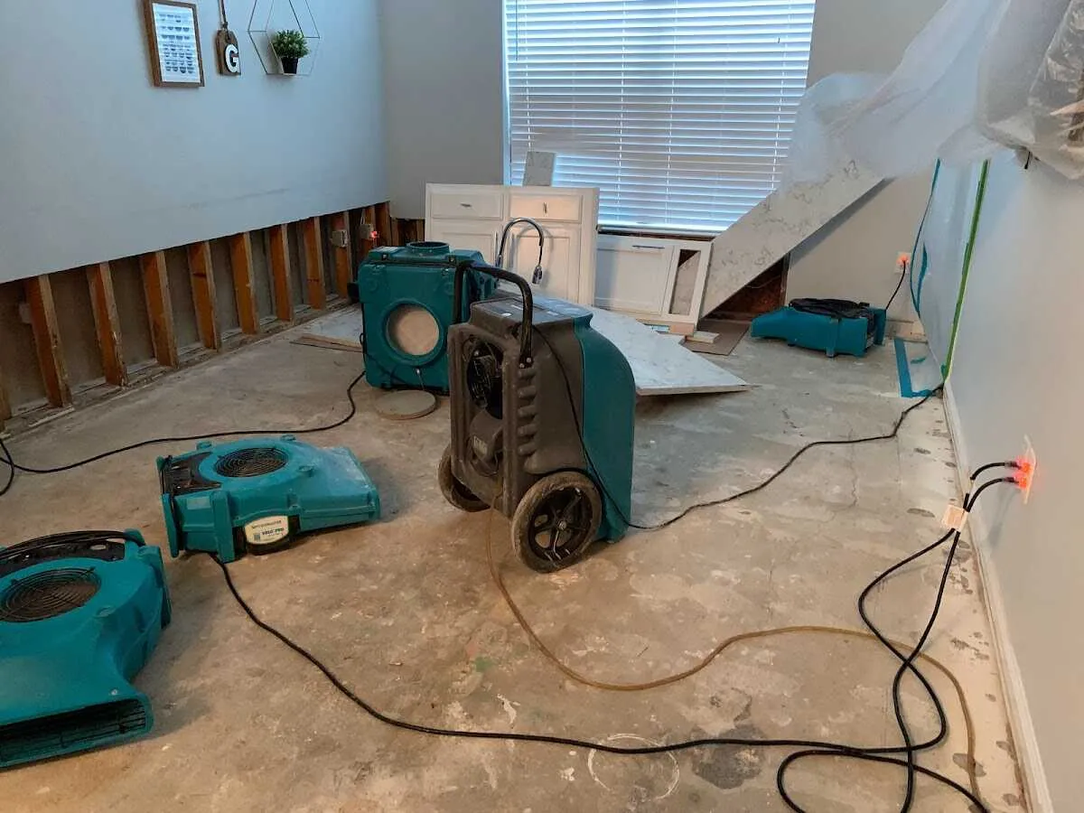 Dehumidifier in flood-cut room for Water Damage Restoration in Thomas